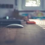 Creative designer desk with graphic design tools, representing AI logo makers for small business branding