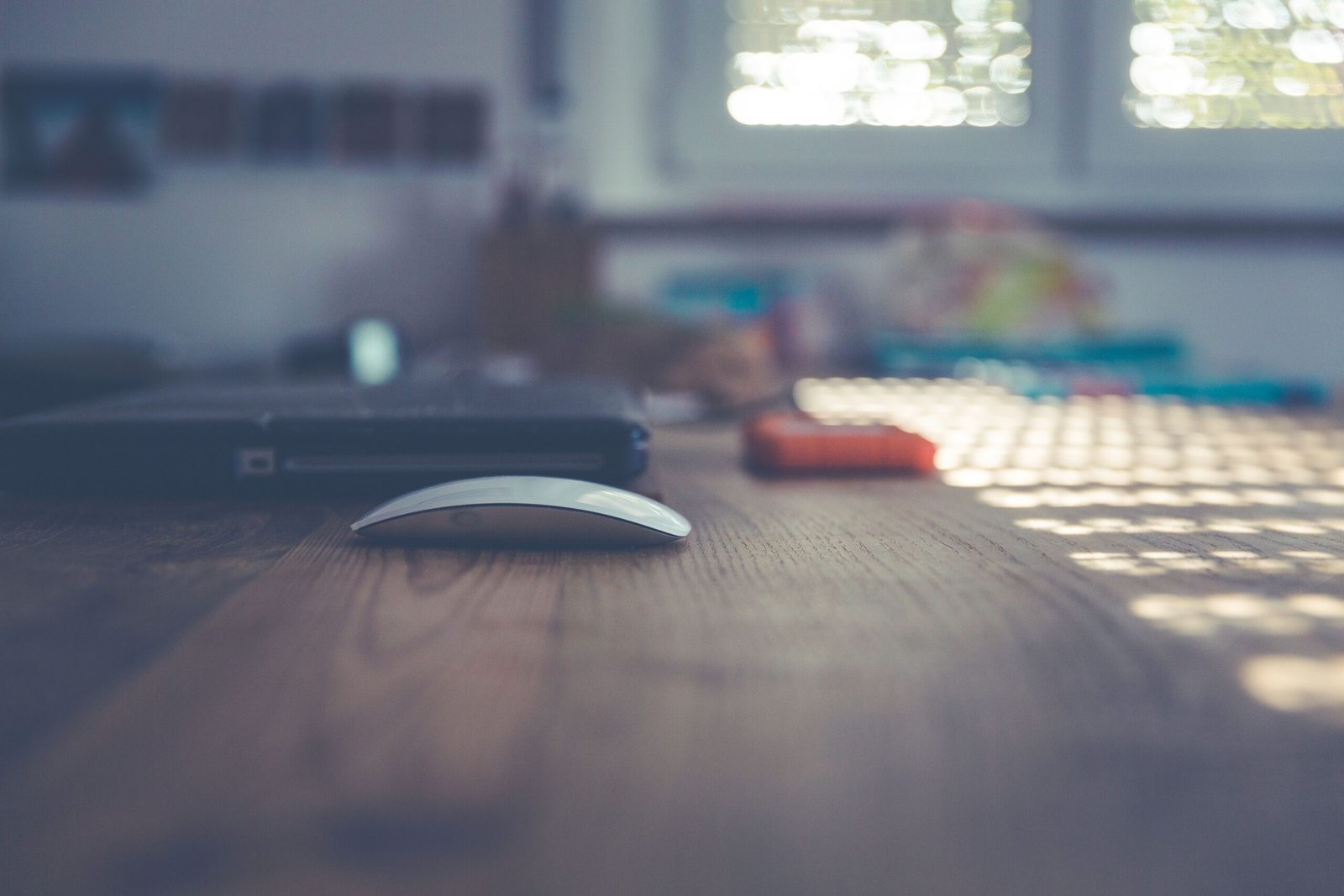 Creative designer desk with graphic design tools, representing AI logo makers for small business branding