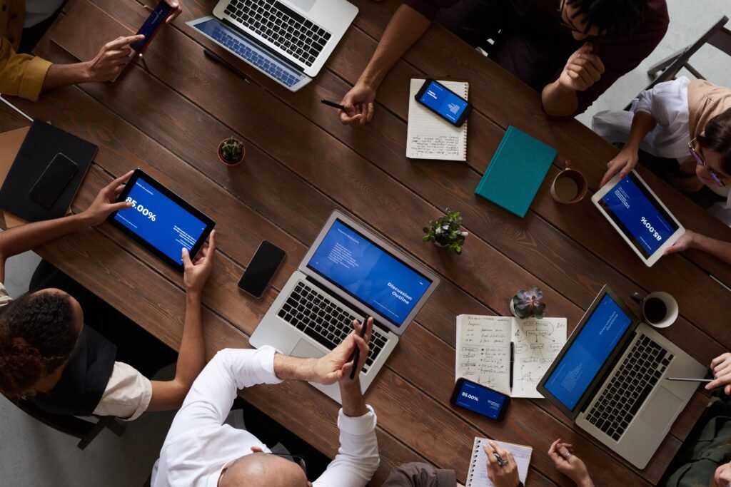Diverse multicultural business team collaborating in a meeting, representing AI translation tools for business