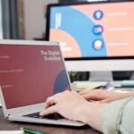 Hands typing on a laptop keyboard, representing AI prompt engineering tips for better ChatGPT and Claude results